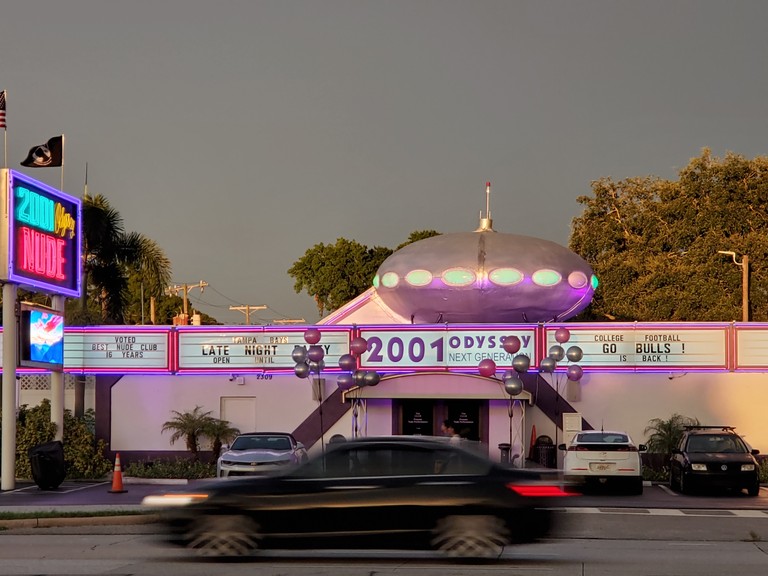 Exterior of 2001 Odyssey strip club in Tampa, Florida, 2019. Image courtesy of Jim De Mauro.
