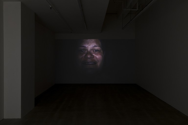 Salote Tawale, Creep, 2014, digital video, 03:11, installation view. Image courtesy of Cheska Brown.