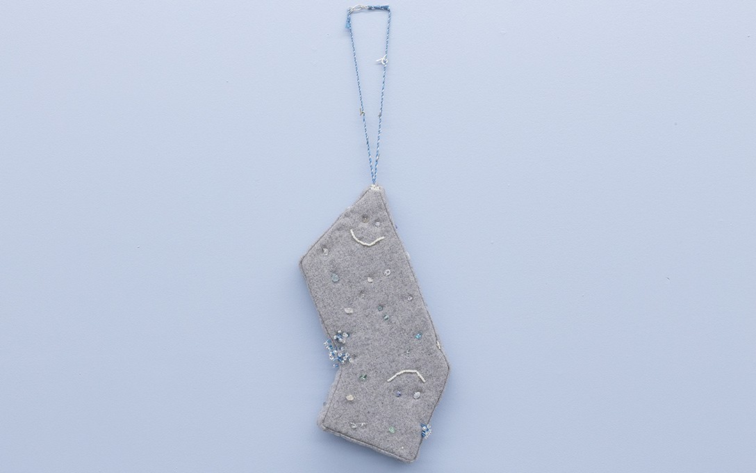 Greta Menzies, Happy Talisman, 2021, sterling silver, wool, glass, cotton, crystals. Image courtesy of Cheska Brown.