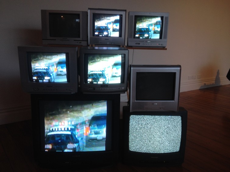 TV stack displaying 'Michael Jackson Motorcade' by Shahriar Asdollah-Zadeh in 'The Screen'