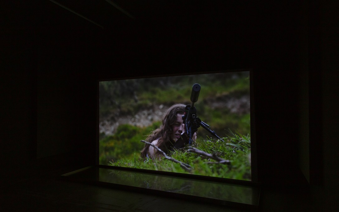 Henrietta Fisher, Funny how I'm always on the head of a longing arrow, 2024, single-channel 4k video, custom aluminium tray, water, installation view. Image courtesy of Cheska Brown.