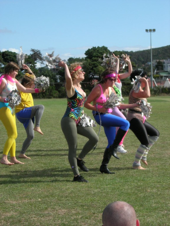 Eve performs in The Real Hot Bitches dance troupe during the SLIPs community soccer tournament.