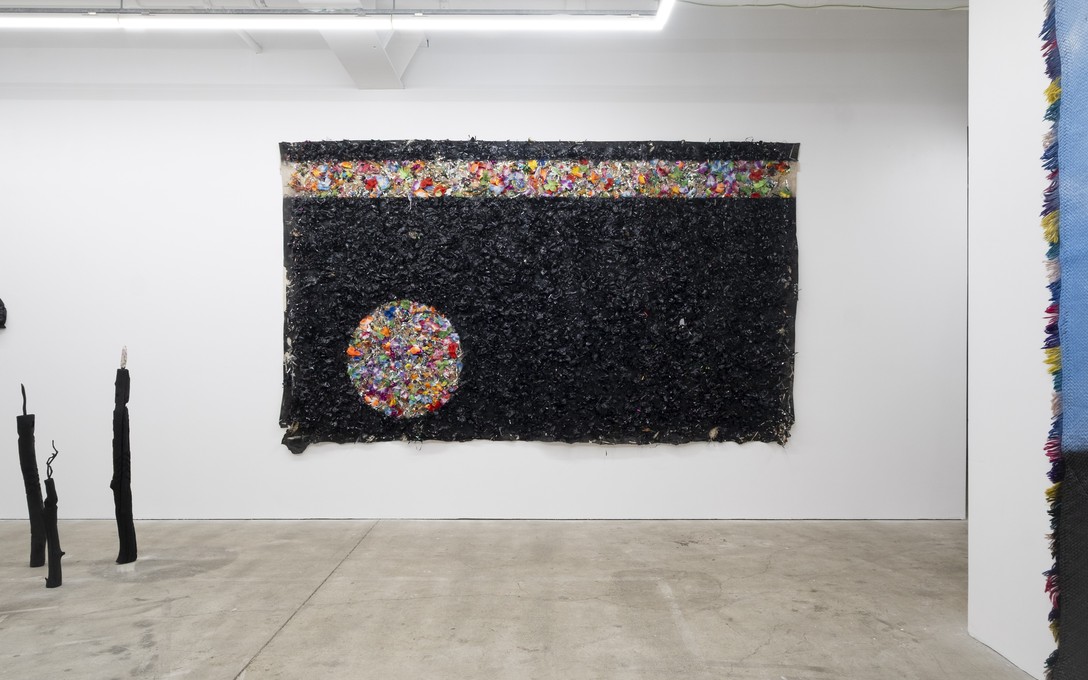 Telly Tuita, The Great Land of Oz (mixed media diptych), 2023 and Screaming Idol series (driftwood & acrylic paint), 2026. Photo by Samson Dell.