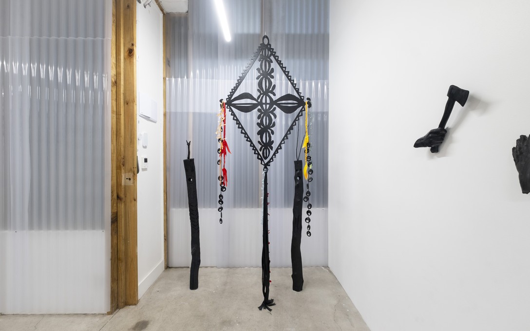Telly Tuita, Mobiles #3 Kalou (MDF, spray paint, ribbons, found shells and toys), 2026. Photo by Samson Dell.