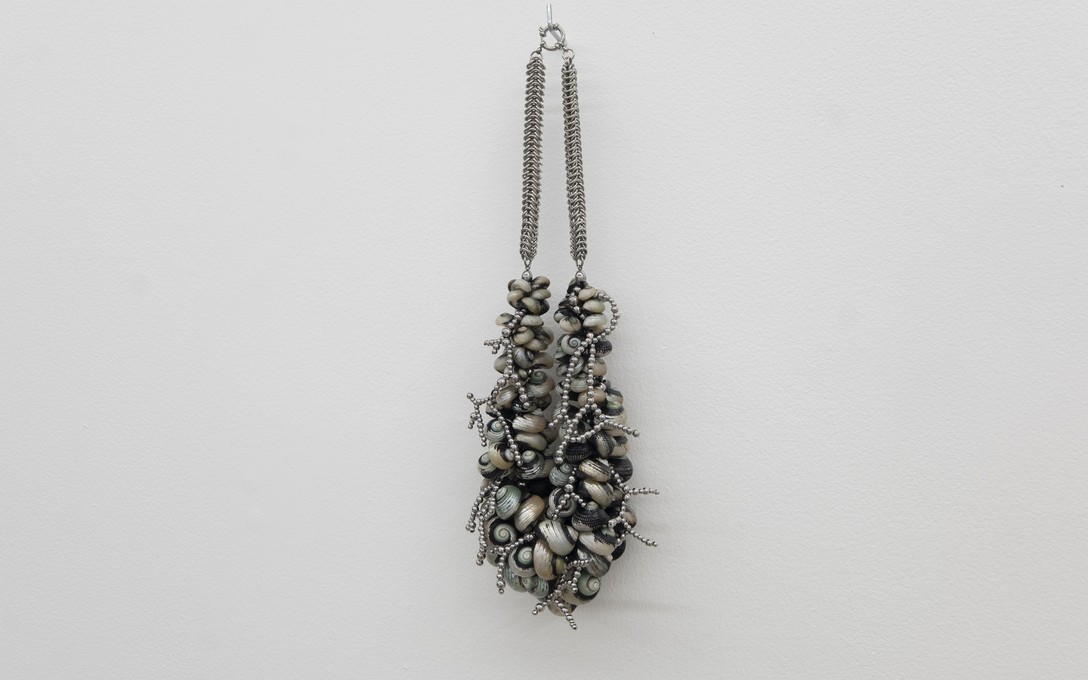 Bailey Gardner, Untitled #1, Pūpū shells, steel, nylon, fishing line, 2026. Photo by Samson Dell.  