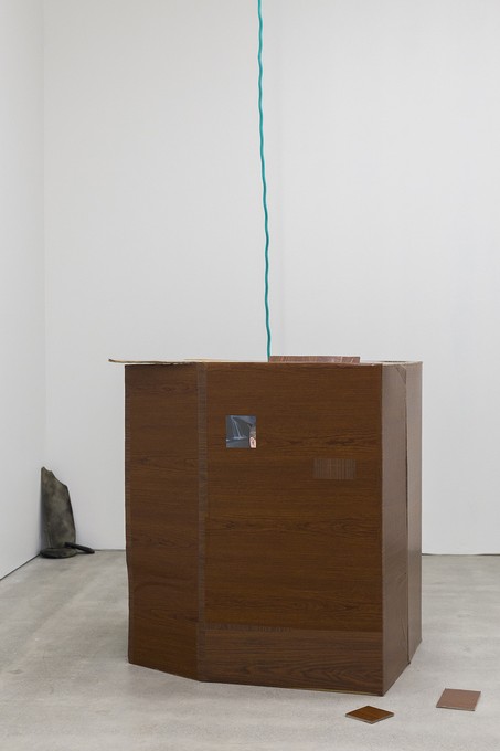 Louisa Beatty, Oak chest, 2019, card board, contact paper, photographic print, glass, tin barrel, pump. Image courtesy of Cheska Brown.