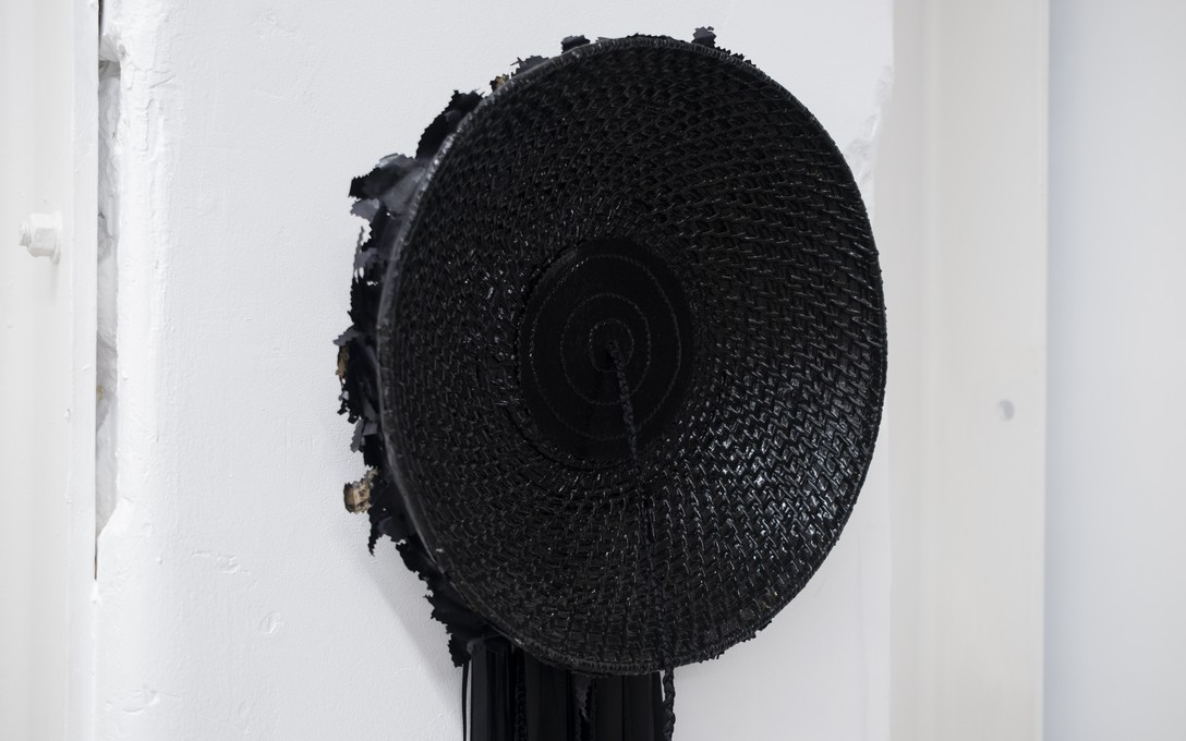 Telly Tuita, 'Uli'uli Elphaba (woven bowl, ribbons, paper, spray paint), 2026. Photo by Samson Dell.