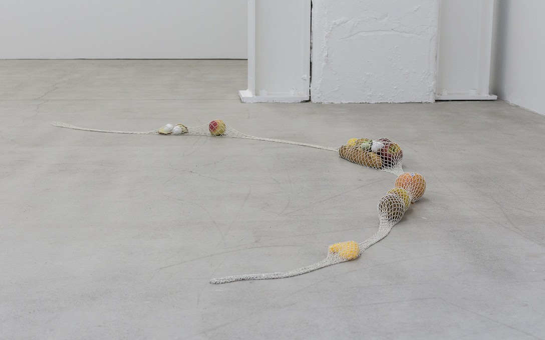 Lucy Meyle, Snake’s dress, 2020, silver-plated chain, jump rings, real and fake foods. Image courtesy of Cheska Brown.