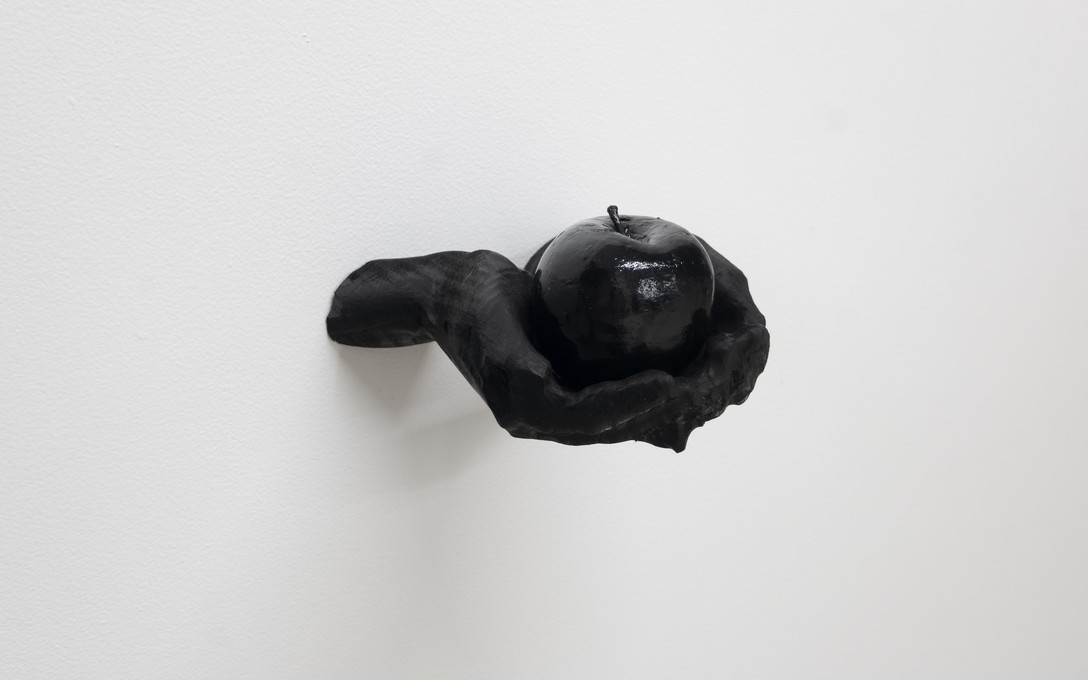 Telly Tuita, Repressed Memories series: Hands holding Apple (CNC routed macrocarpa & spray paint) fabricated by Hamish Garry, 2026. Photo by Samson Dell.