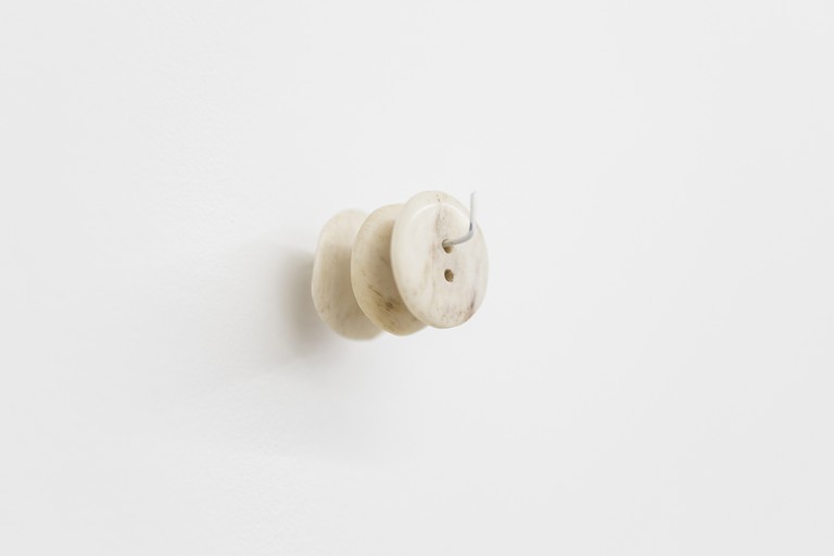 Daegan Wells, Bush coat, 2020, detail, three hand carved bone buttons. Image courtesy of Cheska Brown.