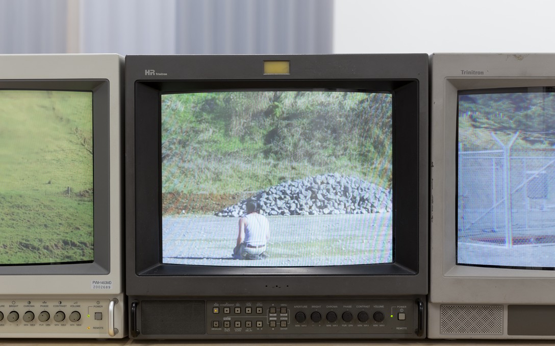 Elvis Booth-Claveria, Wells: Gas, Wishing, Tear and Fare, 2025. Multi-channel video installation. Filmed at the decomissioned Pōuri A well site, Tikorangi. Detail view. Courtesy of Cheska Brown.