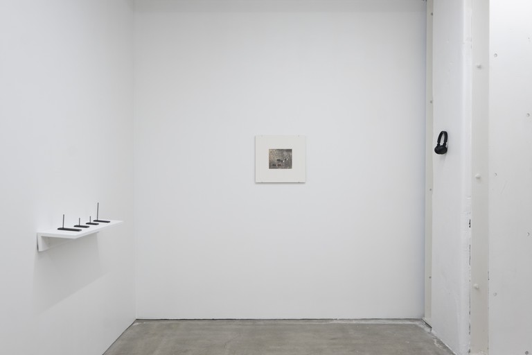Yana Dombrowsky-M’Baye, three baskets woven from a memory recalled, 2026, installation view. From left to right: patinated steel mounts (inscribed); silkscreen print on EMIGA invoice for Sumatra benzoin (1951), double-exposed with an image of the estate of Jacques-François Roger; nocturnal soundscape of the artist’s great-aunt’s bedroom in Sénégal interwoven with archival audio recordings, 19:43 mins, loop. Photo by Samson Dell.